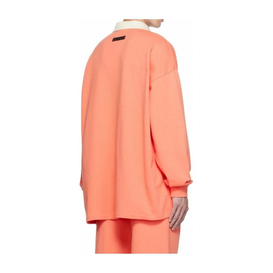 Fear of God Essentials FW22 1977 Henley Rugby in Coral Polo